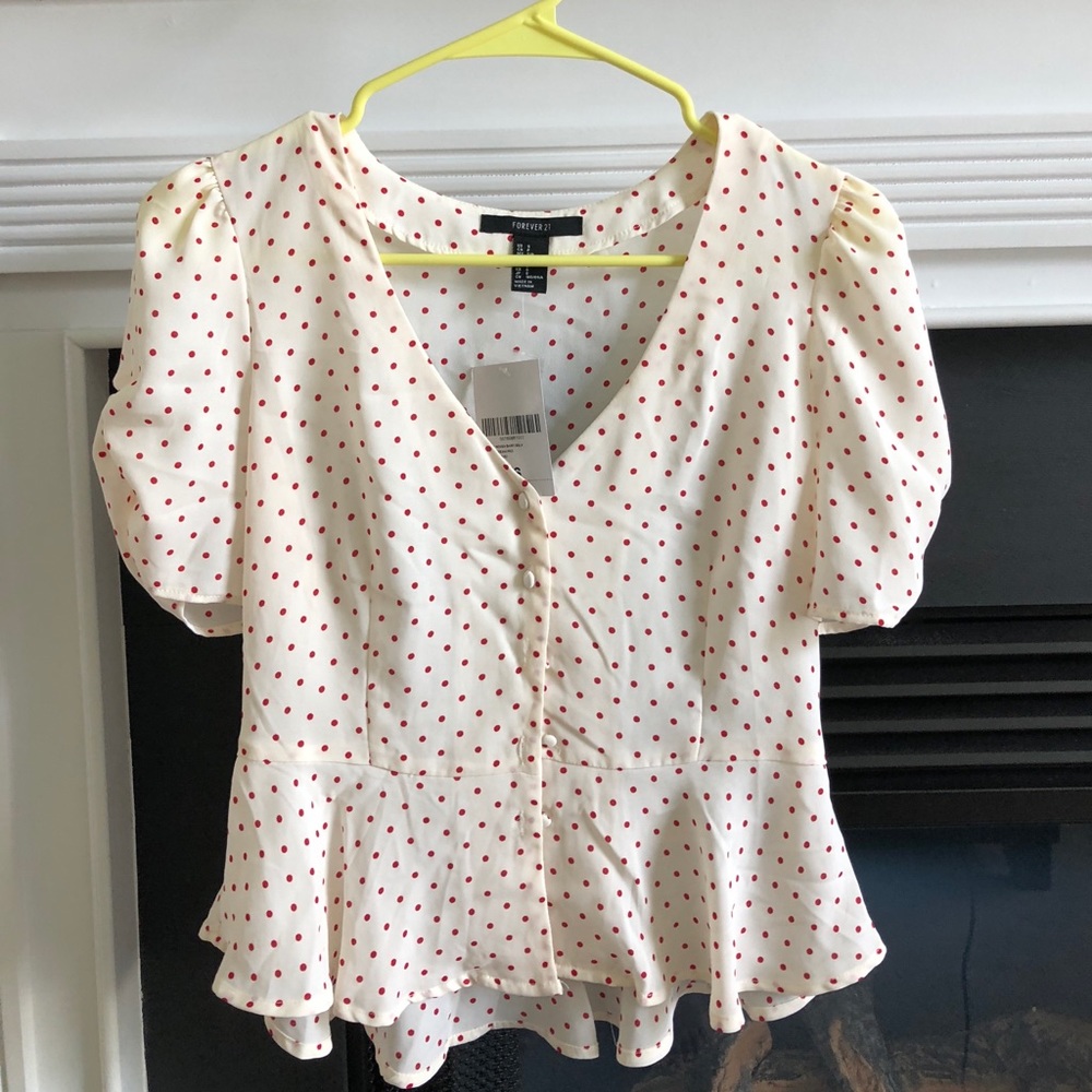 Polka dot patterned blouse